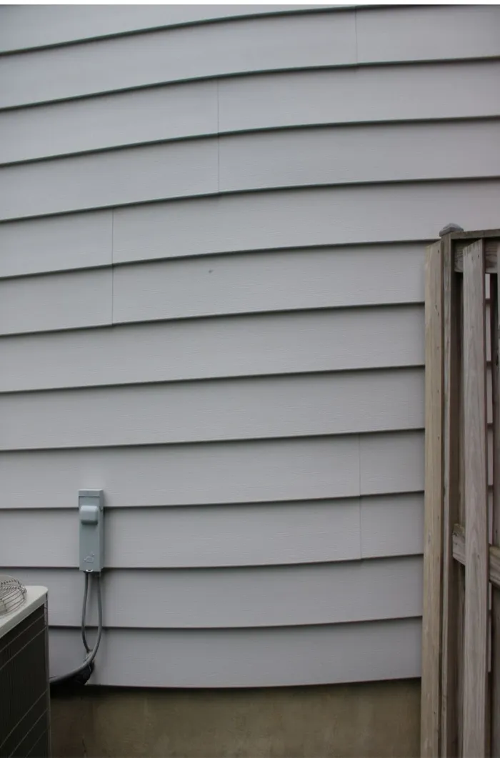 The same siding, clean and even in color after a low-pressure soft wash